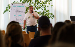 Ehrenmitglied Stephan Brünig hielt die Keynote zum 15-jährigen Jubiläum der JVM.